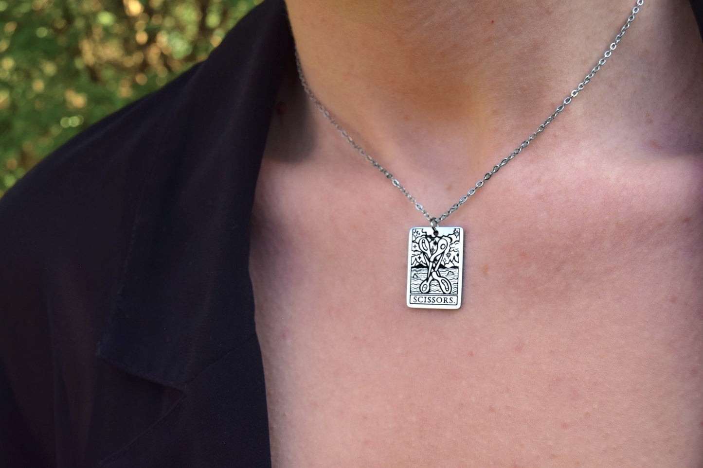 68de2f7800ddcb1087155c2d_scissor-necklace-up-close_1762441259302.jpg