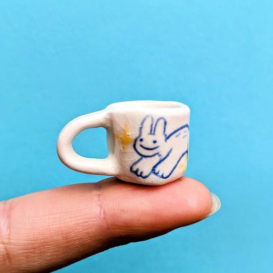 Tiny ceramic mug