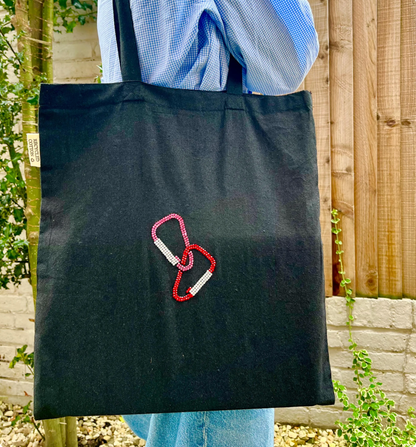 68de2f7800ddcb1087155c2d_carabiner-tote-2_1770900226330.png