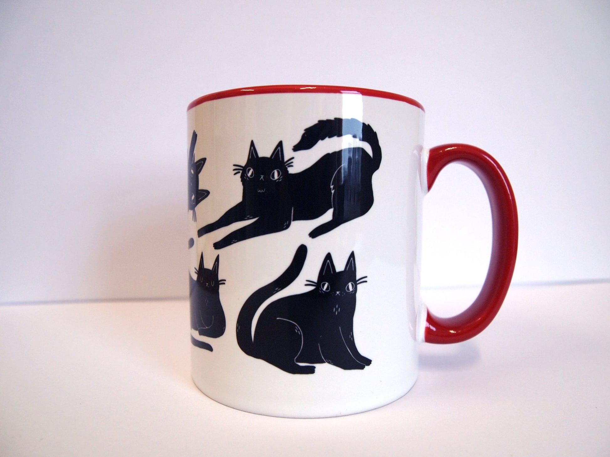 68de2f7800ddcb1087155c2d_mug-blackcats4_1771329292791.jpg