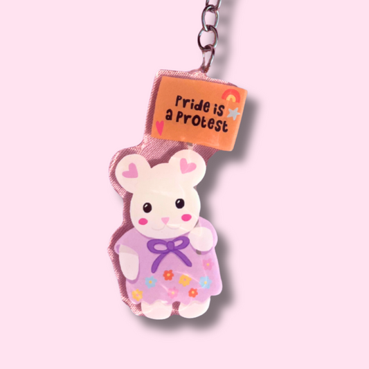 68de2f7800ddcb1087155c2d_pride-is-protest-keychain-1_1760368895115.png