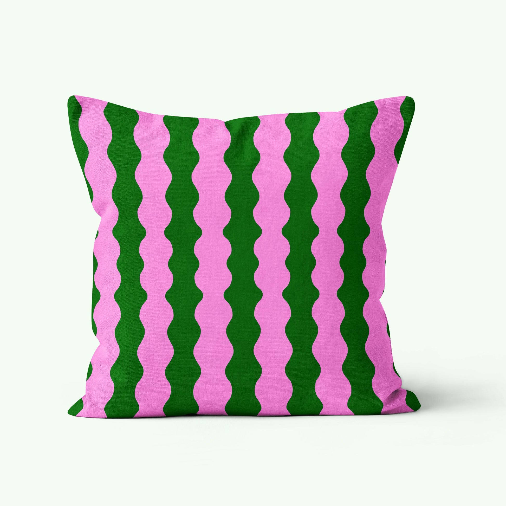 68de2f7800ddcb1087155c2d_wiggle-cushion-in-green-and-pink_1760526277813.jpg