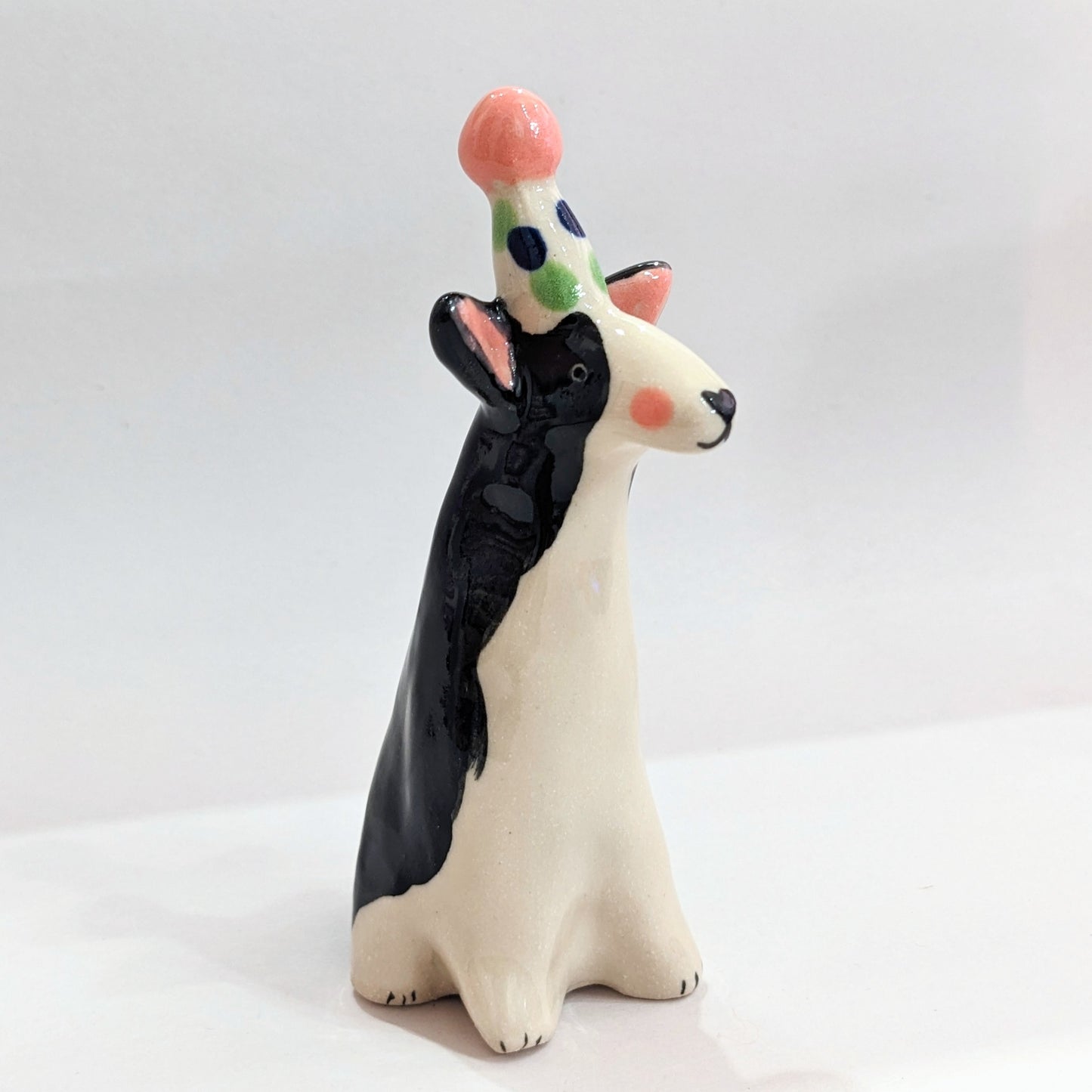 Ceramic dog with party hat