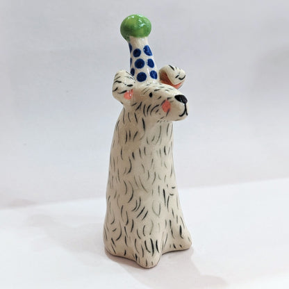 Ceramic dog with party hat