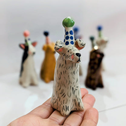 Ceramic dog with party hat